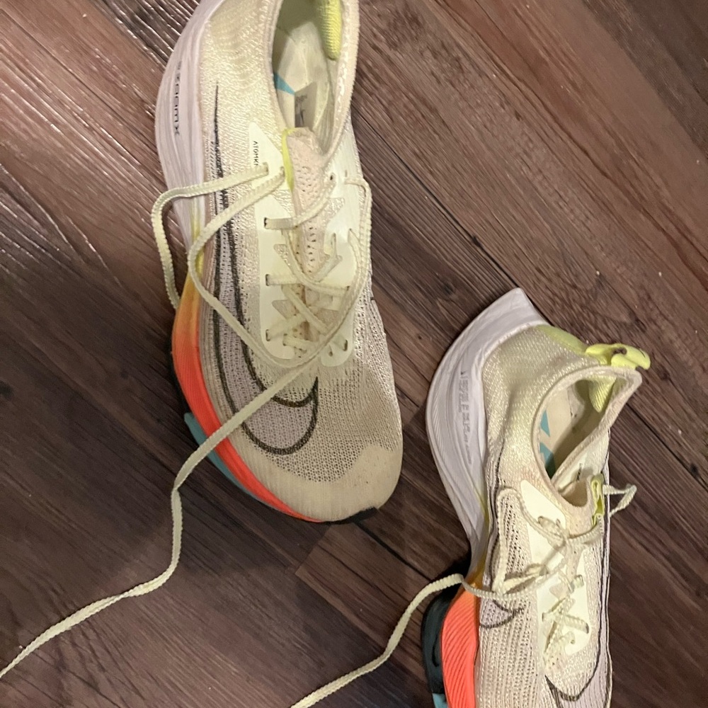 Nike Cream and Orange Athletic Shoes for Performance